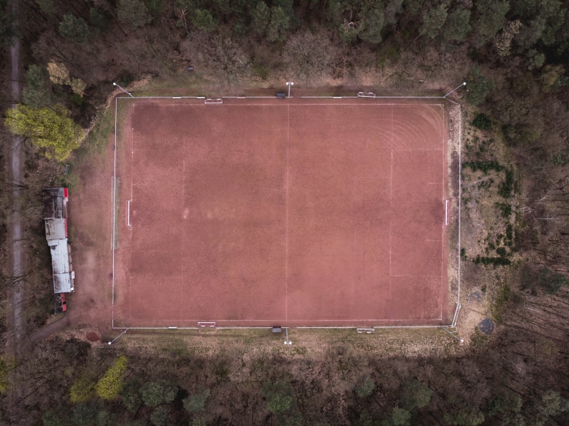 ground, tree, wall - building feature, sports, weathered, dji mavic air, plant, building, day, dji, no people, architecture, brown, old, building exterior