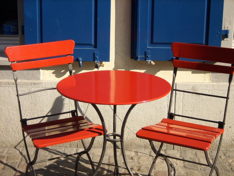 no people, garden furniture, orange color, 2K, chair, relax, building, cafe, shadow, red, casement window, seat, outside catering, photo, break, blue