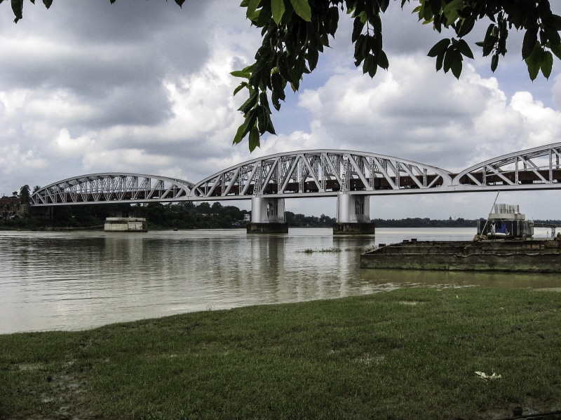 architecture, no people, arch bridge, calcutta, river, sky, built structure, connection, Kolkata, India, day, building exterior, landscape, clouds, bridge - Man Made Structure