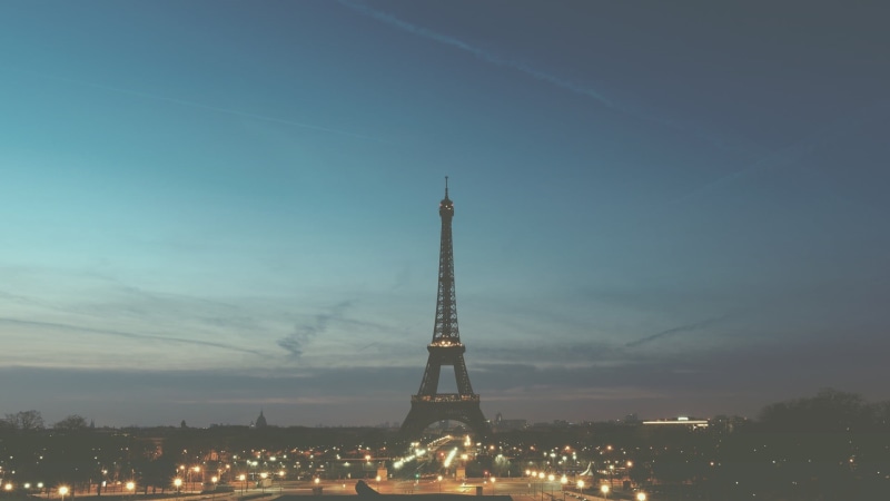 low angle view, travel destinations, iron - metal, city, nature, spire, building exterior, architectural feature, the past, vapor trail, cityscape, tall - high