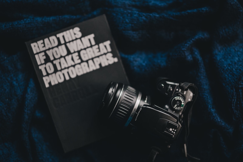 camera, photography themes, hobby, learning, communication, still life, equipment, high angle view, canon, digital camera, book, indoors, metal, photographic equipment