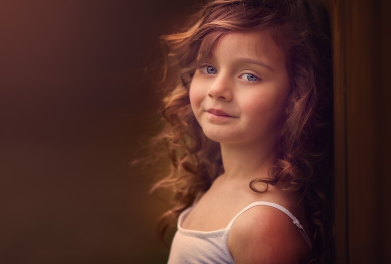 offspring, 1080P, Child, indoors, long hair, looking at camera, curly hair, looking, portrait, headshot, Girl, innocence, spaghetti straps, hair, one person