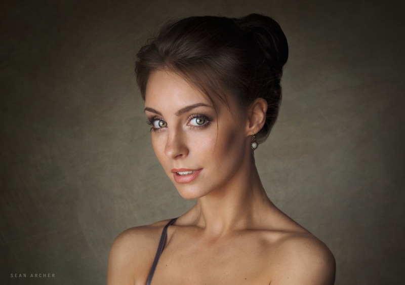 brunette, women, 1080P, simple background, Sean Archer, hairbun, face, green eyes, Anastasiya Peredistova, portrait