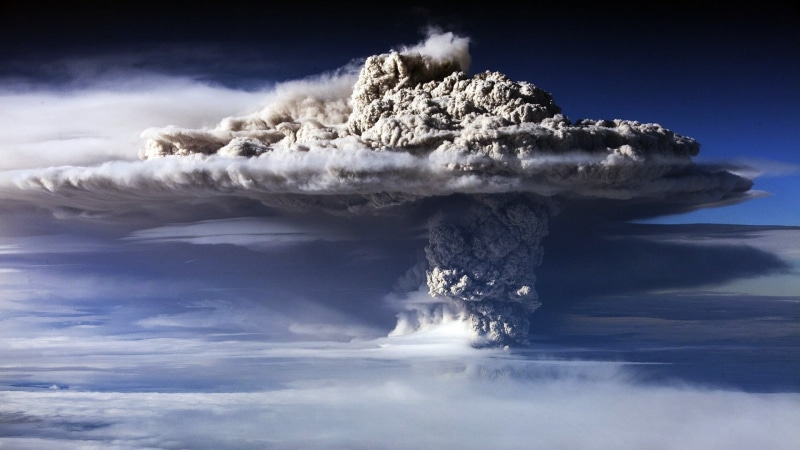 explosion, environment, day, smoke, cloud - sky, sea, rock, idyllic, water, scenics - nature, non-urban scene, volcano, tranquility, outdoors, blue, beauty in nature