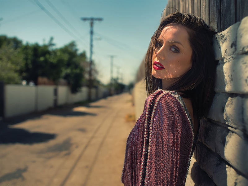 actress, trees, wires, 2K, looking over shoulder, women, street, shoulder length hair, alleyway, sky, depth of field, urban, Ana de Armas, red lipstick