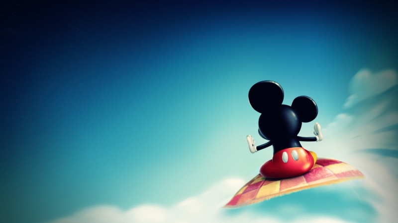 sunlight, cartoon, vignette, sky, human representation, toy, no people, low angle view, outdoors, male likeness, blue background, Mickey Mouse, representation