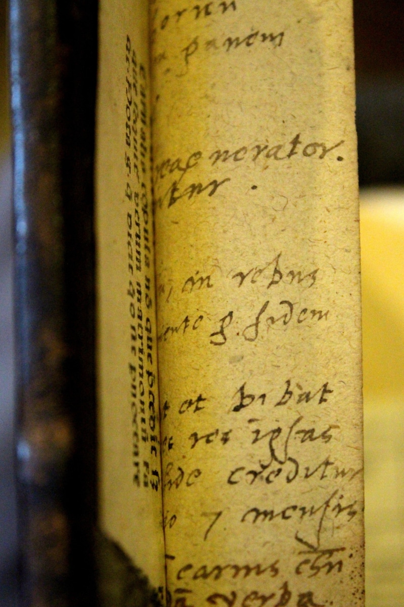 the past, indoors, close-up, communication, no people, leather, handwriting, text, publication, focus on foreground, literature, book cover, old, script