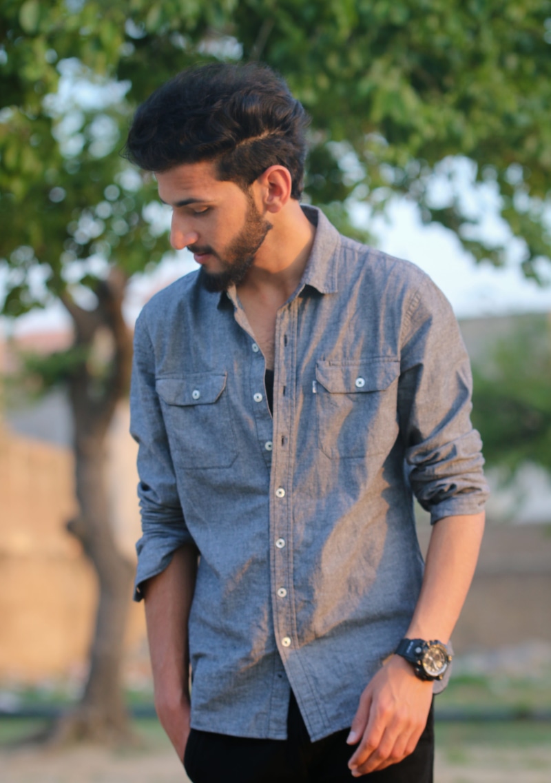 jeans, 5K, day, waist up, outdoors, casual clothing, young adult, focus on foreground, one person, front view, standing, fashion, pakistan, adult, contemplation