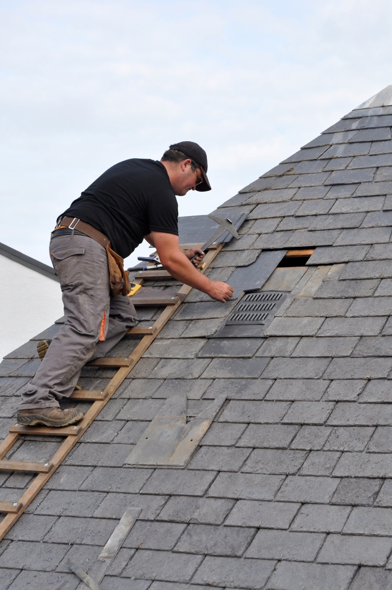 day, men, artisan, mid adult men, sky, casual clothing, real people, leisure activity, lifestyles, nature, occupation, architecture, coverage, roofing