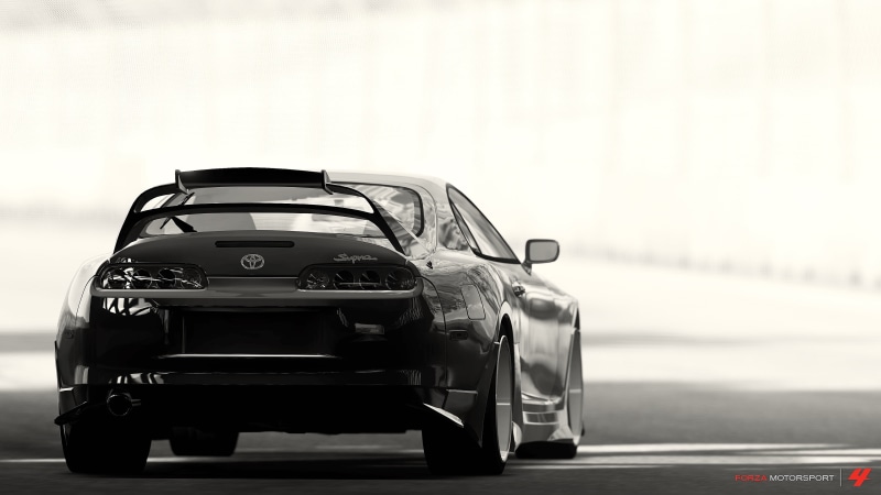 outdoors, sports race, travel, toy, sport, street, black, mode of transportation, number, city, competition, auto racing, roof, day, Toyota Supra, motor vehicle