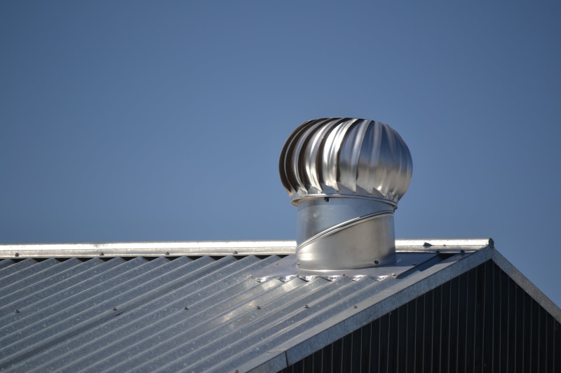 sky, directly below, built structure, roof, aluminum, silver, outdoors, technology, copy space, vent, steel, tin roof, tin vent, turbine, no people, metal roof
