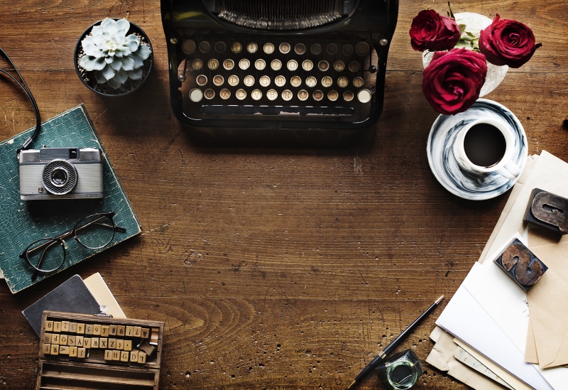 editorial, roses, close-up, high angle view, book, machine, food and drink, large group of objects, analog, message, indoors, old, information, technology
