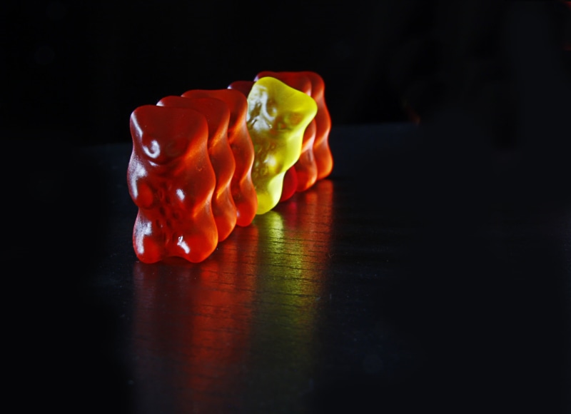 fruit jelly mix, bears, indoors, multi colored, gelatin, candy, creativity, sugar, black background, reflection, nature, haribo, food, orange color, 2K