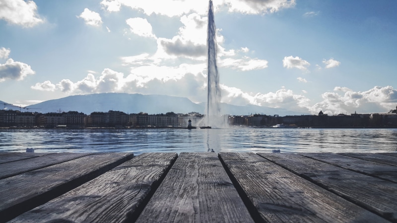 5K, non-urban scene, fontain, boardwalk, beauty in nature, wood, pier, cloud - sky, scenics - nature, wooden, sky, lake, surface level, city, wood - material