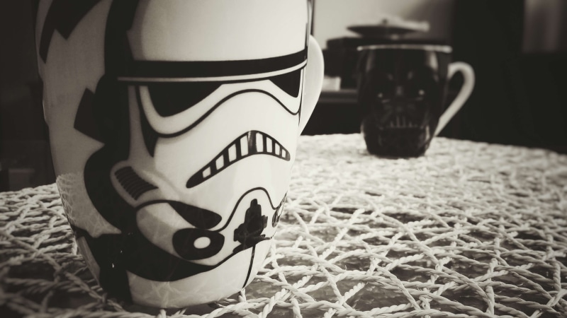 focus on foreground, absence, sunlight, stormtrooper, shoe, human representation, lord vader, close-up, outdoors, still life, single object, rebel, art and craft