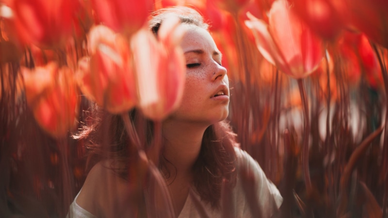 model, women, bare shoulders, flowers, long hair, portrait, nature, closed eyes, 1080P, Ruby James, open mouth, brunette, freckles, pierced nose, women outdoors