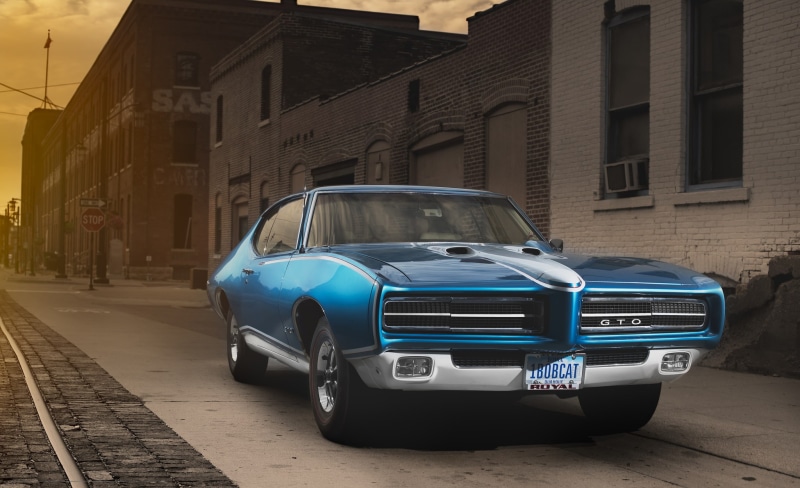 parking, gto, no people, luxury, motor vehicle, vintage car, architecture, pontiac, city, day, stationary, blue, coupe, land vehicle, built structure, muscle car