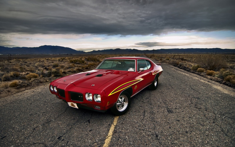 coupe, stationary, transam, landscape, mountain, road, no people, red, non-urban scene, transportation, land vehicle, road trip, muscle car, Pontiac GTO
