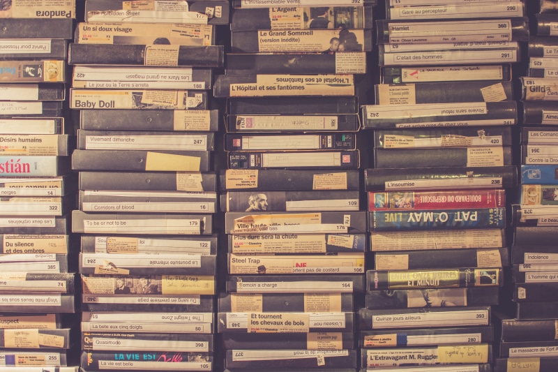 no people, indoors, title, retail, cases, tape, still life, collection, abundance, pattern, stack, backgrounds, arrangement, container, in a row, vh, full frame