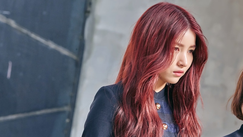 focus on foreground, beautiful woman, K-pop, contemplation, one person, South Korea, hair, teenager, long hair, brunette, adult, casual clothing, dyed hair
