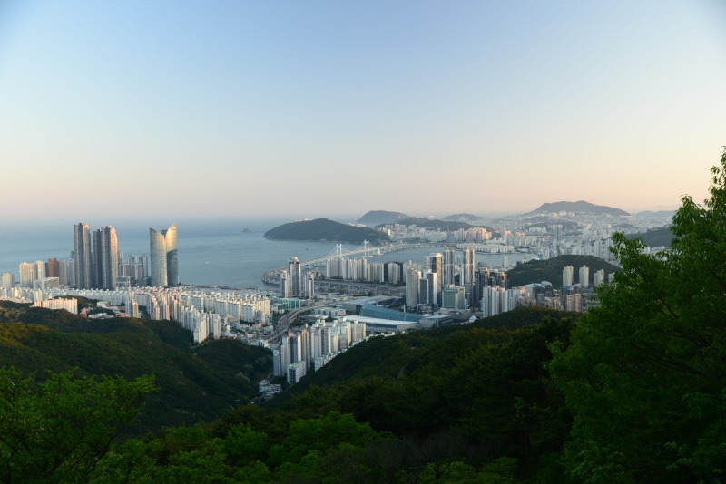 city, busan, built structure, water, 5K, building exterior, building, travel destinations, mountain, clear sky, skyscraper, outdoors, high angle view