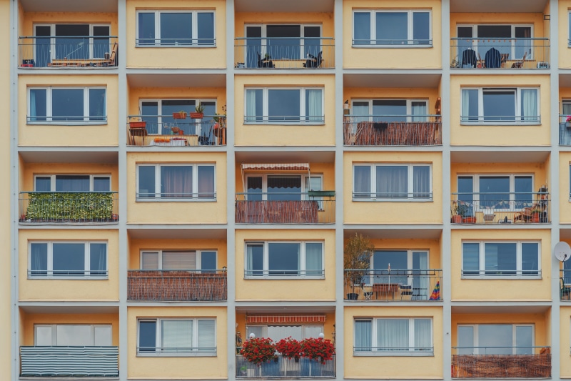 exterior, built structure, brown, symmetrical, architecture, concrete, no people, city, living, building, architectural, glass - material, urban, apartment