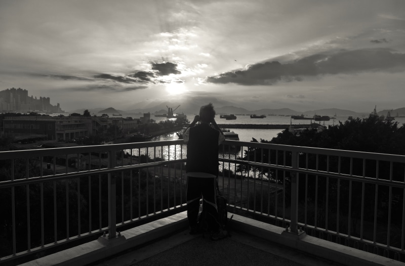 sky, lifestyles, warm clothing, people, men, sea, rear view, landscape, hong kong, full length, b/w, building, connection, cityscape, west kowloon cultural district