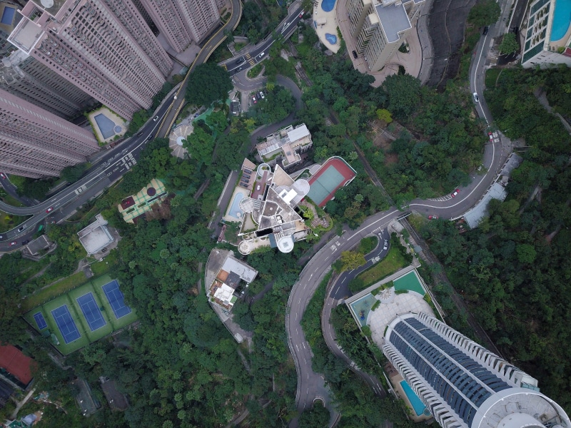 eye, outdoors, 4K, roof, high angle view, tree, street, environment, metropolis, view, scenery, city, no people, mode of transportation, aerial view, neighborhood