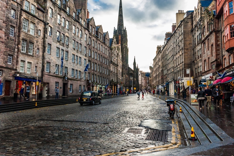 road, motor vehicle, transportation, 2K, car, land vehicle, street, architecture, incidental people, cobblestone, direction, city, mode of transportation