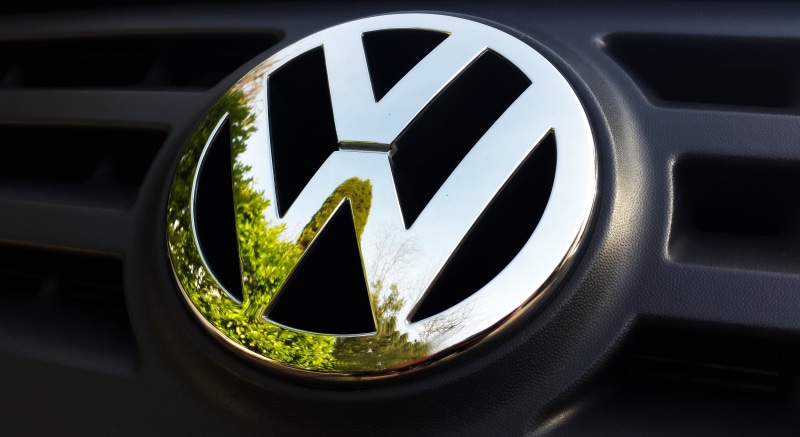 vehicle, camping bus, single object, close-up, black color, shape, silver colored, geometric shape, emblem, circle, vw, information sign, nature, auto