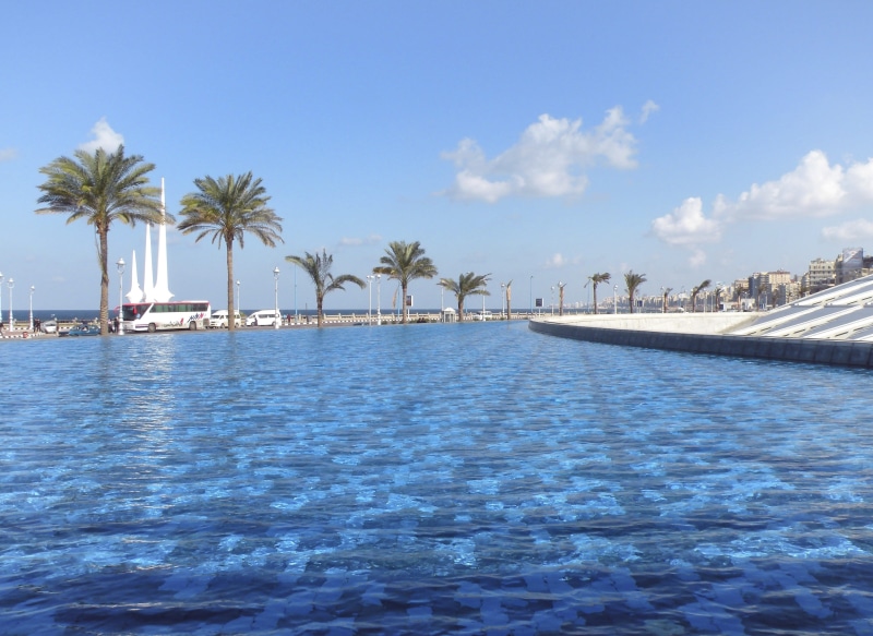 nature, tree, water feature, built structure, building exterior, water, library, palm tree, cloud - sky, no people, swimming pool, beach, tropical climate