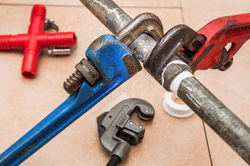 indoors, blue, focus on foreground, diy, renovation, plumber, spanner, no people, fix, high angle view, leaking, control, handyman, wrenches, technology