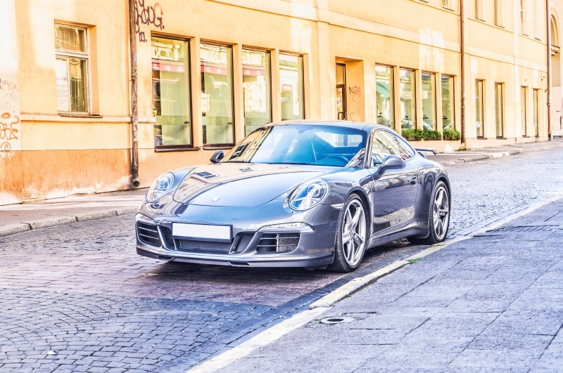 expensive, sportscar, colourful, porsche, asphalt, gray, sports car, vehicle, urban, shiny, car, transportation, road, parked, stationary, outdoors, auto