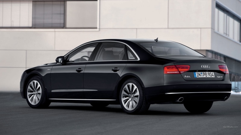 wheel, built structure, mode of transportation, audi, car, motor vehicle, day, Audi A8, transportation, land vehicle, focus on foreground, motion, building exterior