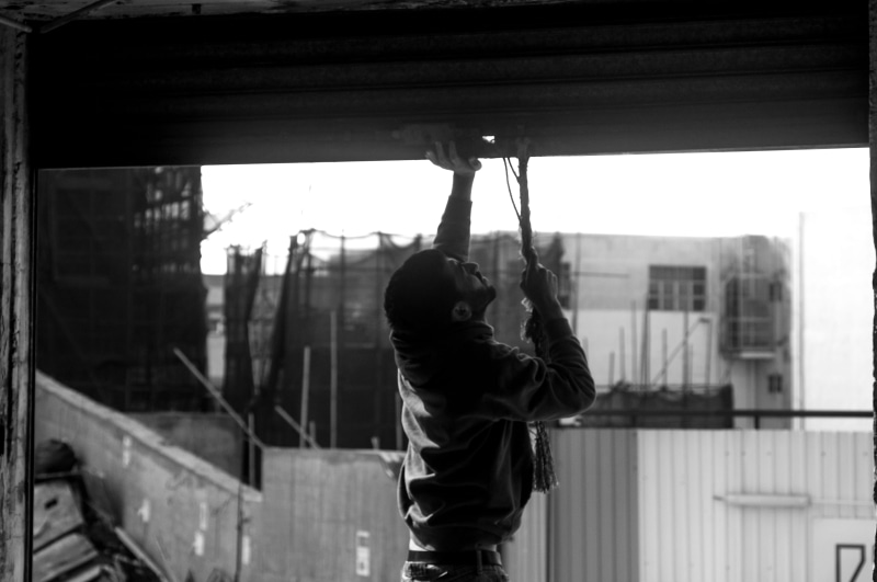 day, architecture, building, child, outdoors, men, built structure, casual clothing, rear view, 4K, black and white, focus on foreground, transparent