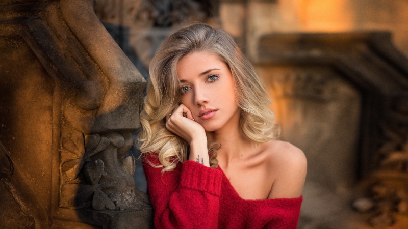 depth of field, face, mouth, red sweater, looking at viewer, looking at camera, blonde, blue eyes, bokeh, Model, bare shoulder, open mouth, portrait, sweater