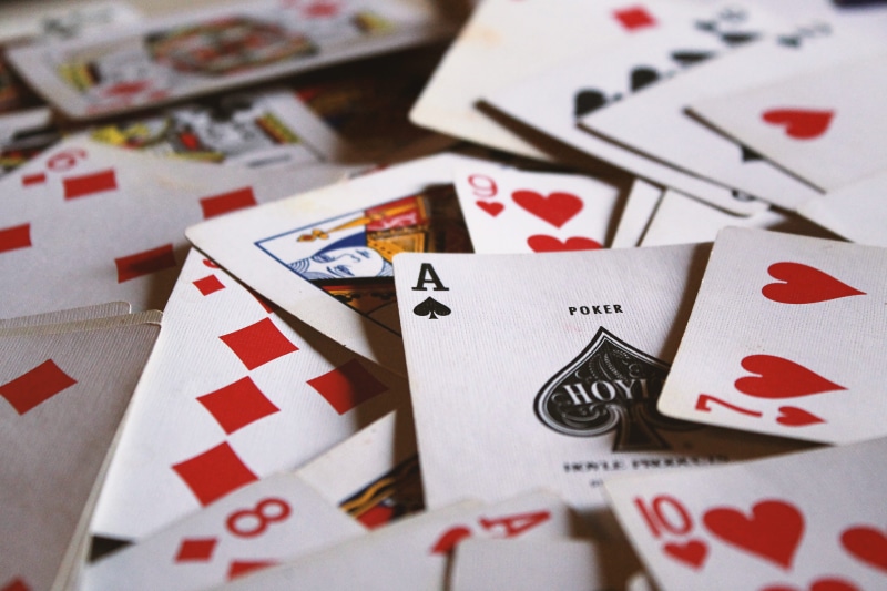 deck of card, poker - card game, red, group of objects, gambling, deck, arts culture and entertainment, closeup, relaxation, blur, playing, opportunity