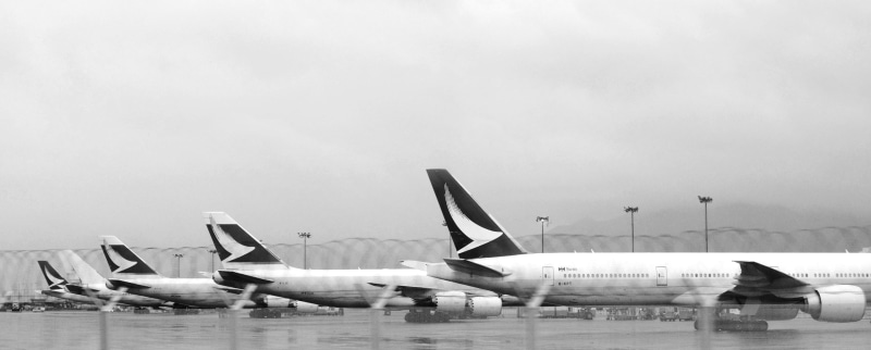 blacknwhite, hongkong, nature, swoosh, copy space, planes, transportation, parked, aeroplane, air force, day, airlines, airplanes, water, cathay, on the move