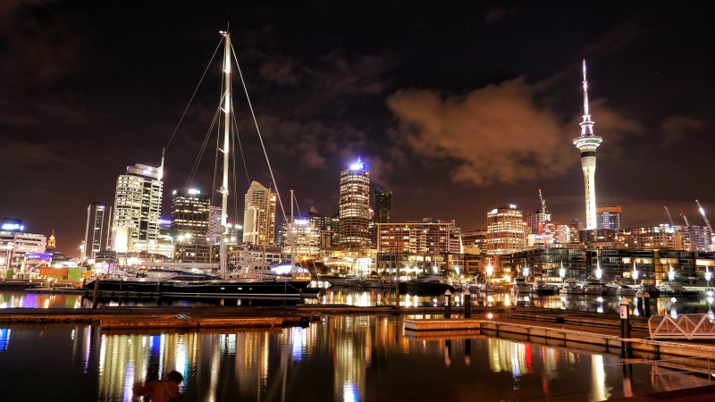 no people, city, illuminated, financial district, built structure, spire, skytower, harbour, landscape, building exterior, modern, sail, water, river, viaduct basin