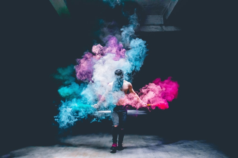 season, one person, young men, casual clothing, real people, black background, smoke - physical structure, smokebomb, moodygram, holding, 5K, building