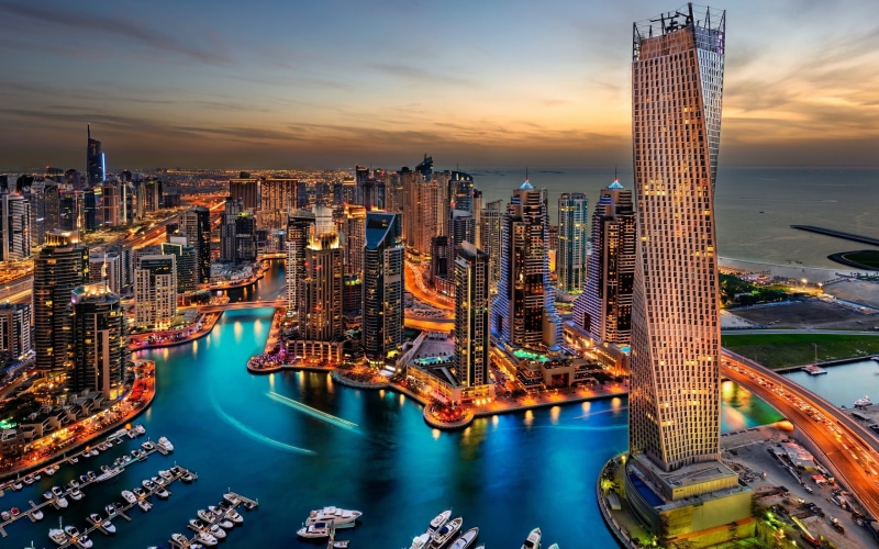 illuminated, built structure, 2K, financial district, travel destinations, water, tower, cityscape, bridge - man made structure, city lights, boat, building exterior