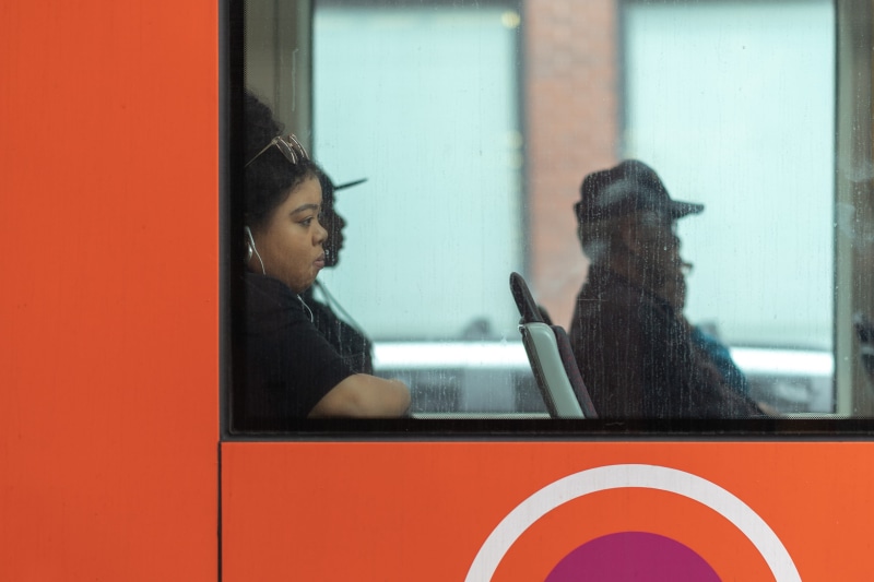 lifestyles, uK, glass, bus, silhouette, riding, young Adult, urban, looking out, apple, street photography, travel, women, outdoors, headphone, city Life