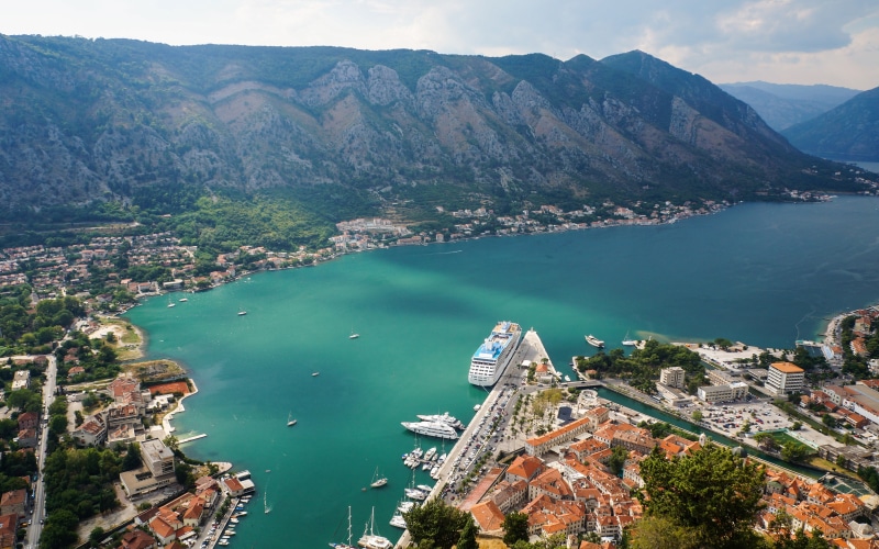 5K, water, sea, high angle view, numerous, medieval, walls, bay, monuments, travel, building exterior, nautical vessel, aerial view, mountain range, city