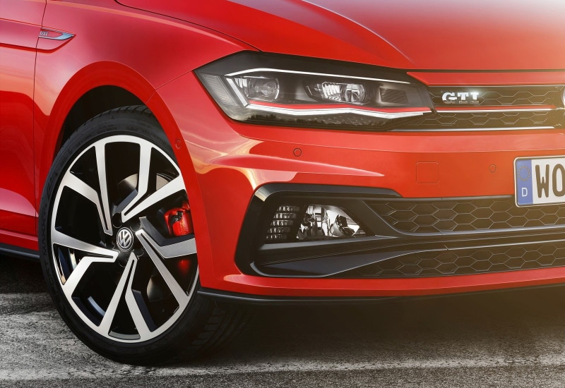 gti, red, land vehicle, metal, polo, outdoors, mode of transportation, tire, chrome, headlight, no people, motor vehicle, luxury, sports car, retro styled
