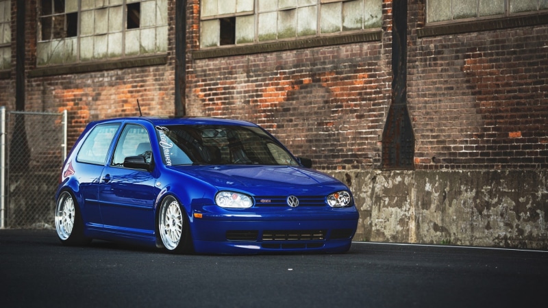 GTI, transportation, day, city, motor vehicle, architecture, brick, Golf IV, retro styled, Volkswagen, blue, motion, vintage car, car, luxury, brick wall