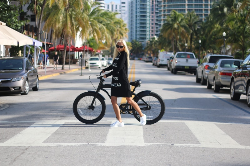 outdoors, building exterior, street, bicycle, lifestyles, daylight, city street, south beach, 5K, motor vehicle, mode of transportation, city life, blonde