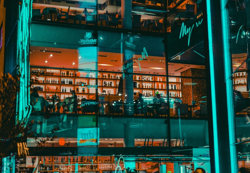 black, collage, full frame, abundance, no people, arrangement, time, illuminated, shop, reflection, pub, glass - material, city, furniture, building, night