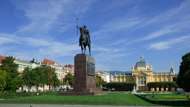 built structure, zagreb, building, king tomislav, creativity, architectural column, sculpture, architecture, building exterior, human representation, cloud - sky