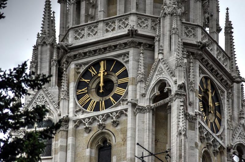 outdoors, building, clock, tower, built structure, religion, zagreb, time, belief, city, clock face, place of worship, building exterior, the past, no people