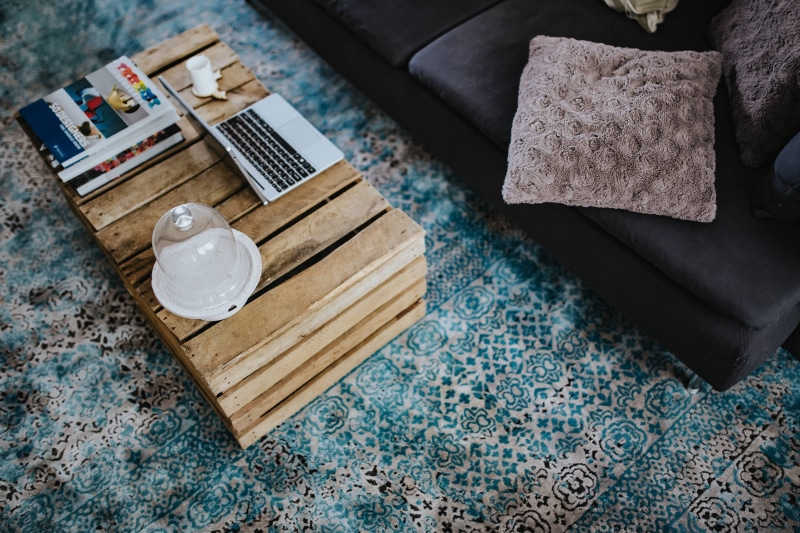 home Interior, blue carpet, decor, relaxation, wood - material, furniture, living room, high angle view, room, pattern, wooden box, tray, Designer, indoors